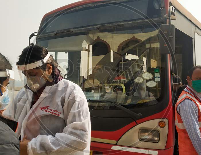 Delhi,India-12/28/2020; Female Passenger Wearing Personal Protective Equipments (Ppe Kit) At Airport During Covid 19 Spread