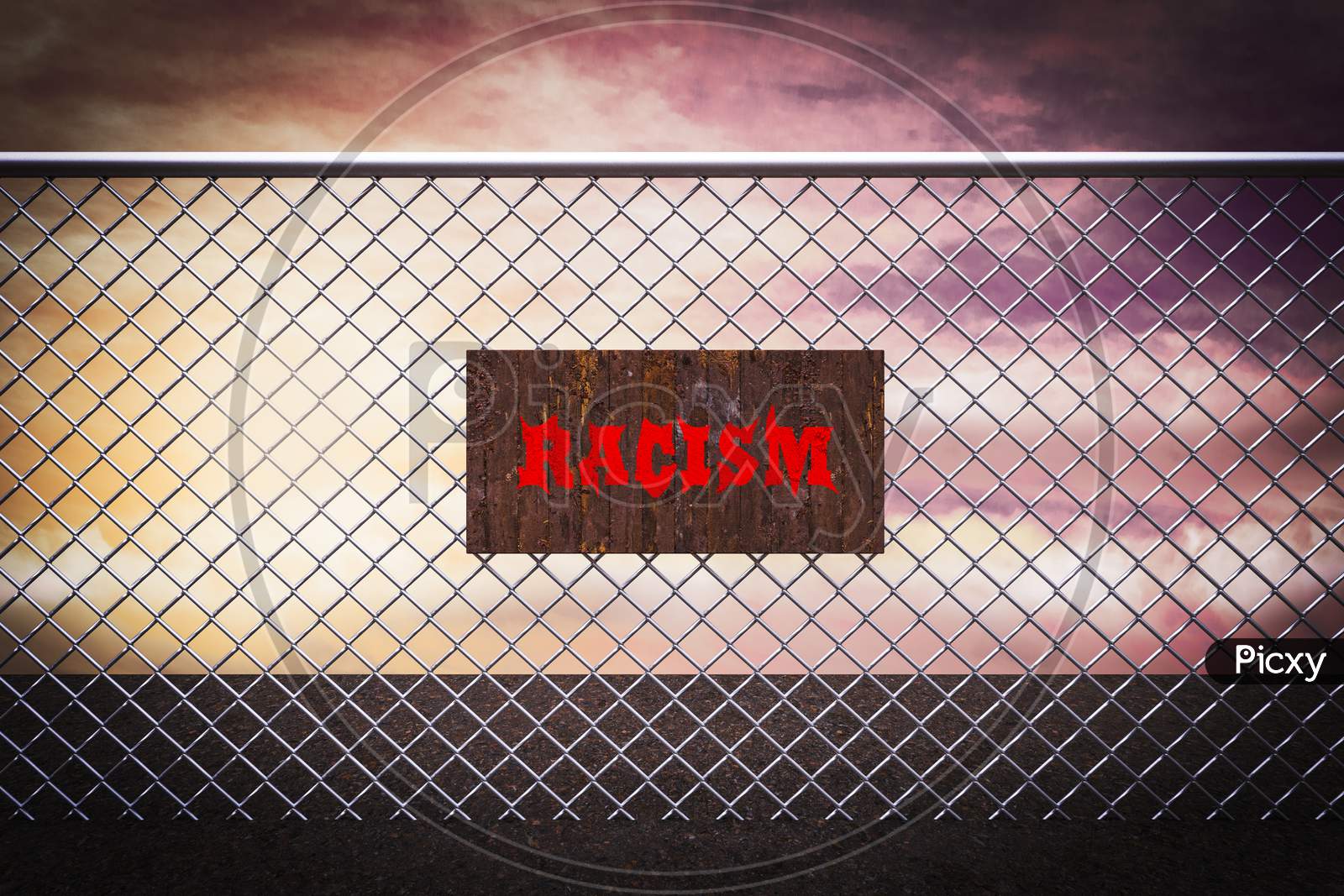 Wooden Racism Sign On Wire Mesh Demonstrating Racism Danger And Discrimination Risk Concept. 3D Illustration