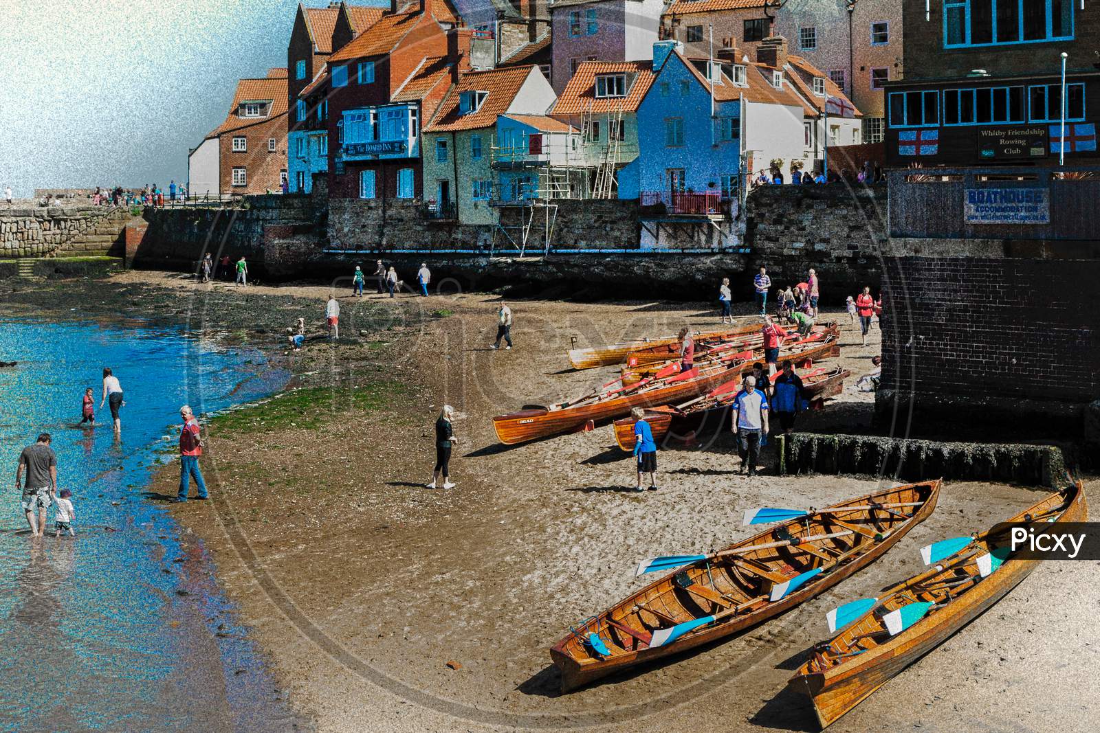 Rowing Boats Beached On The Sand At Whitby