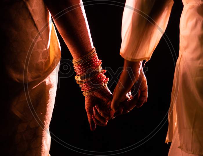 Indian Couple Holding Hands