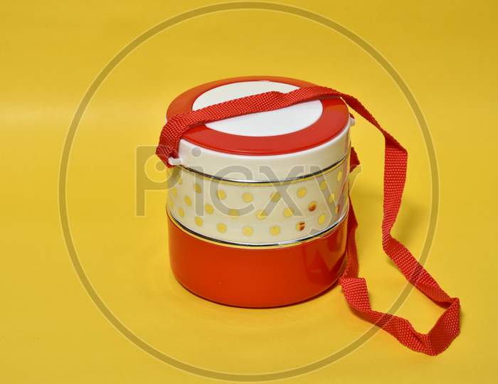 Tiffin isolated yellow background.