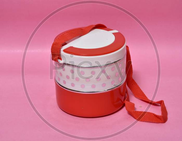 Tiffin isolated pink background.