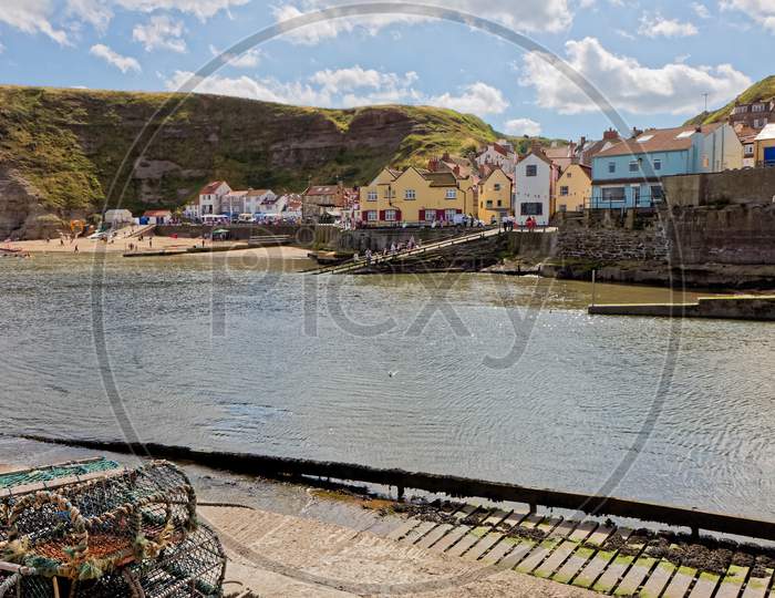 Staithes, North Yorkshire/Uk - August 21 : View Of Staithes Harbour North Yorkshire On August 21, 2010. Unidentified People
