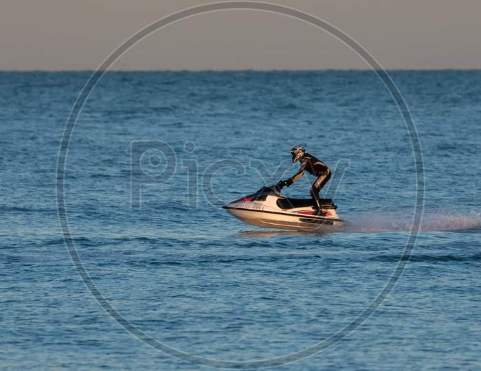 Man Riding A Jet Ski Off Dungeness Beach