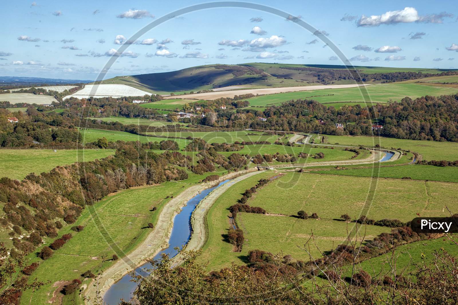 The River Cuckmere Flows Through The Sussex Countryside