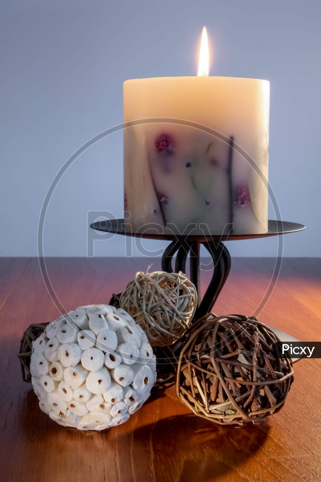 Decorative Candle Alight On Dining Table