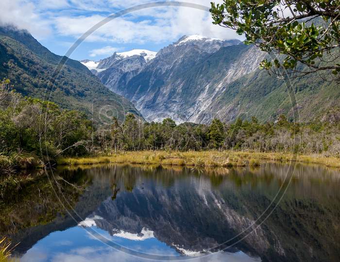Reflections Of The Southern Alps In Peter'S Pool New Zealand