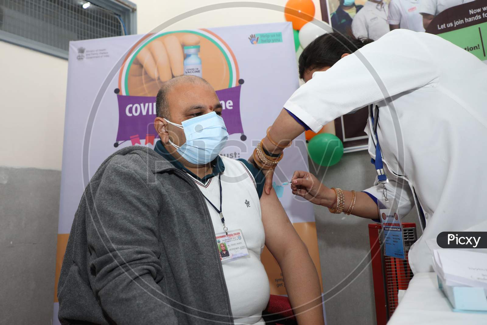 An Indian Doctor Receives A Covid-19 Vaccine At A Government Hospital In Jammu,Jan.16, 2021.
