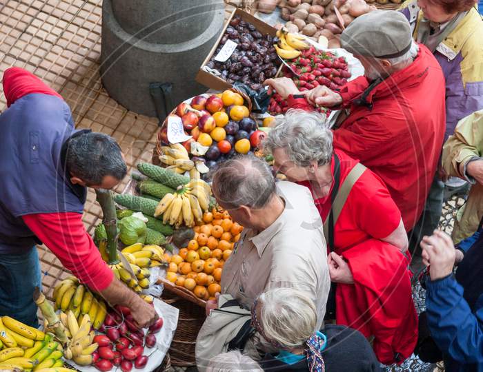 Bustling Fruit And Vegetable Market In Funchal