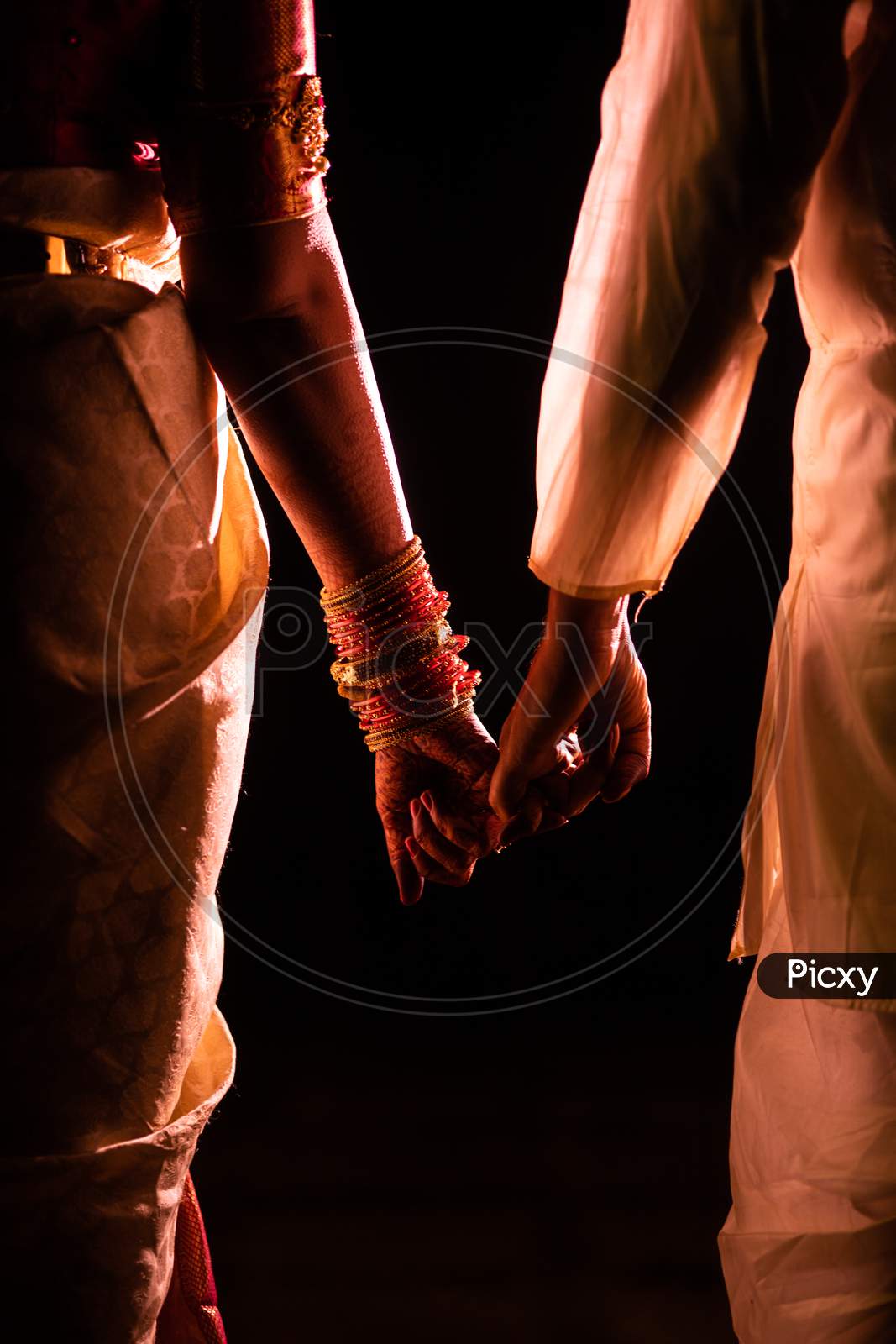 Indian Couple Holding Hands