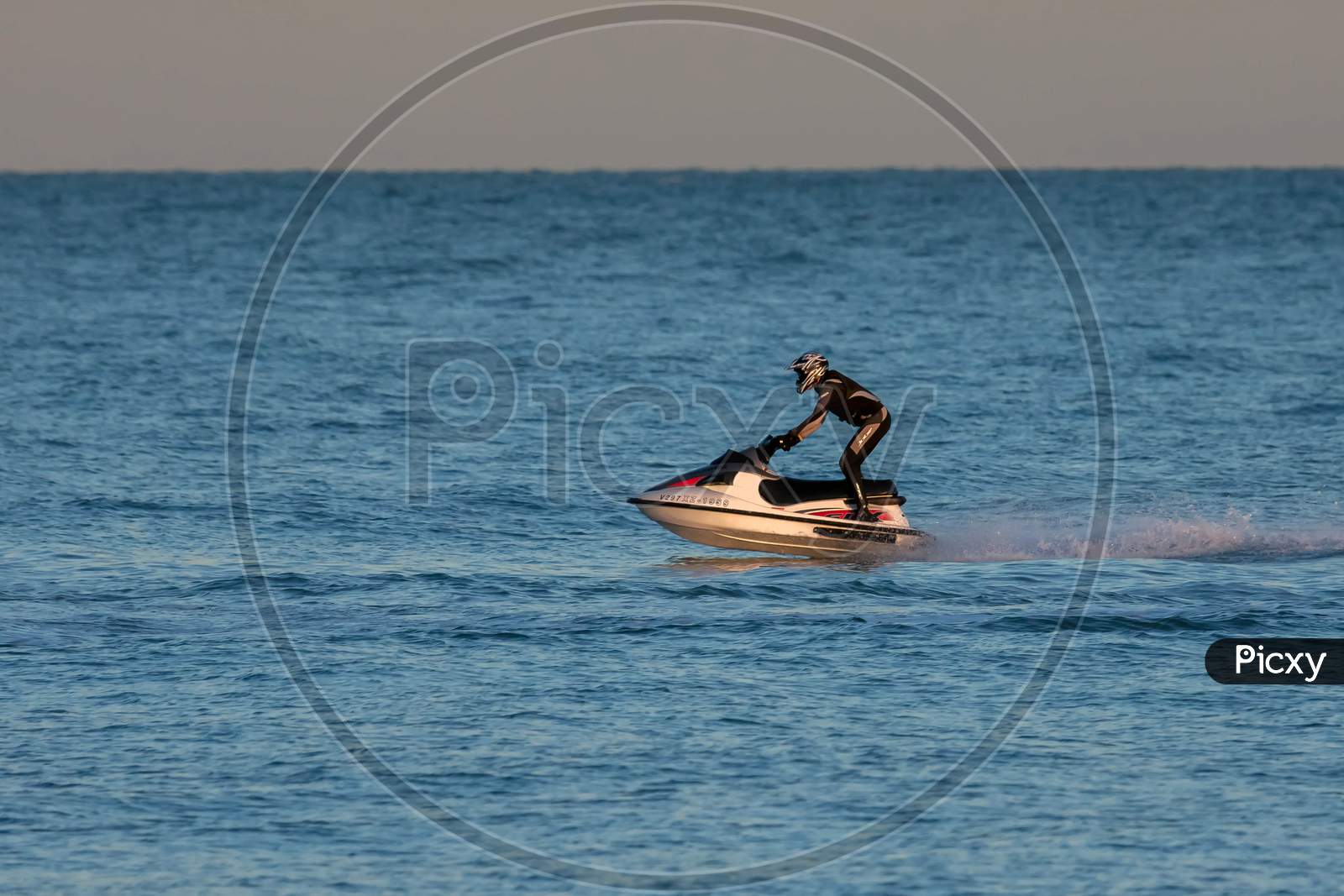 Man Riding A Jet Ski Off Dungeness Beach