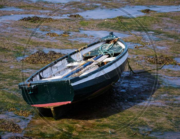 Old Rowing Boat At Low Tide On Holy Island