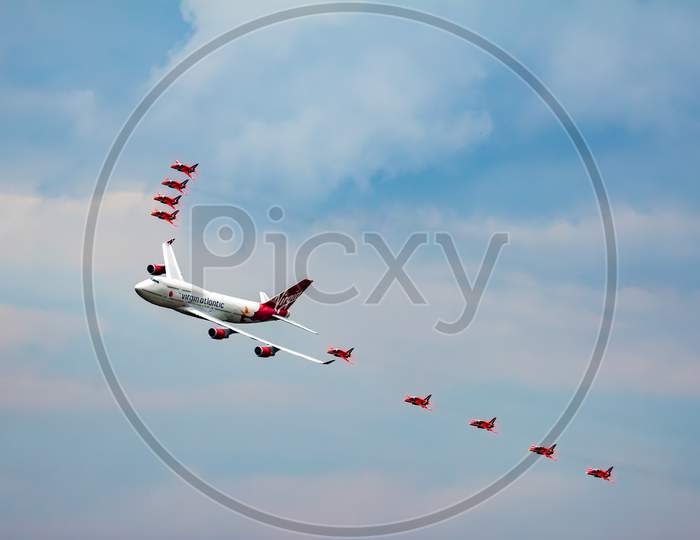 Virgin Atlantic Boeing 747-400 And Red Arrows Aerial Display At