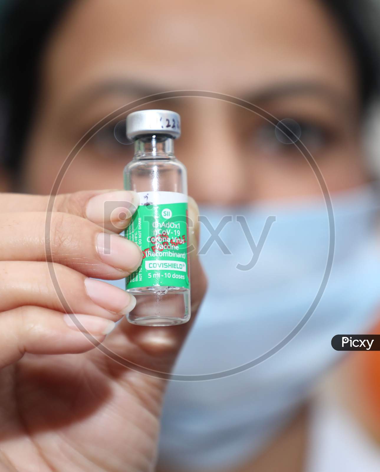 A Health Worker Prepares To Administer Covid-19 Vaccine To A Doctor At A Government Hospital In Jammu,Jan.16, 2021.