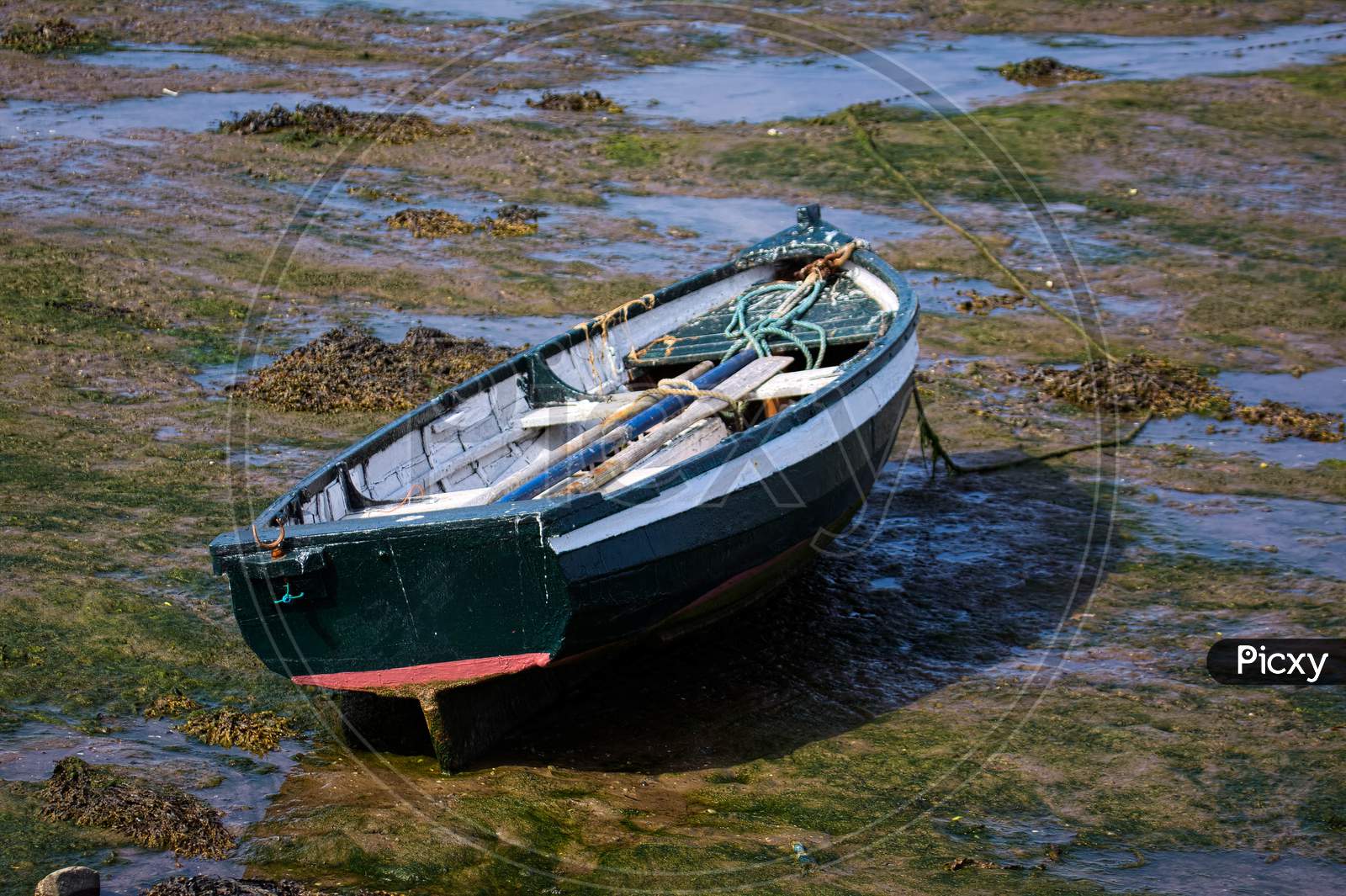 Old Rowing Boat At Low Tide On Holy Island
