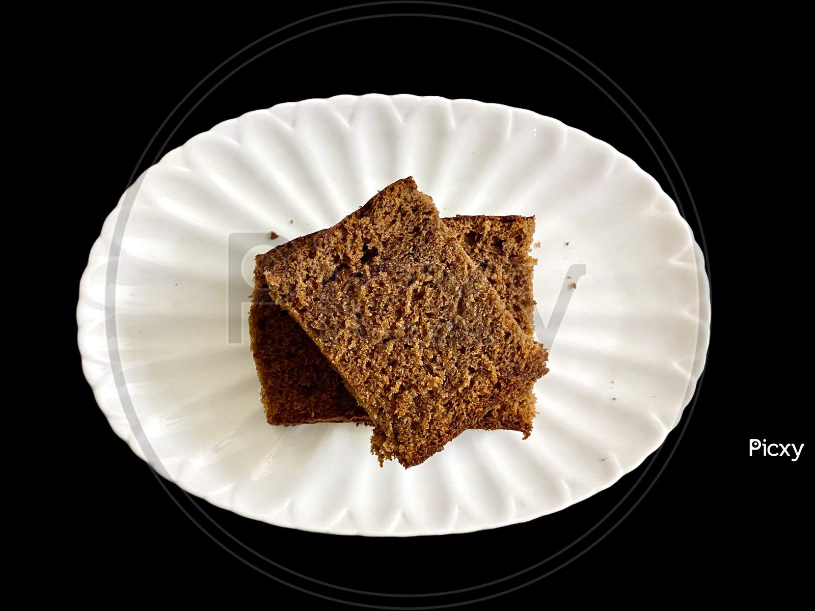 Plain Chocolate Cake Double Slice Being Served In A Plate