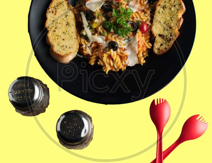 Penne Pasta In Tomato Sauce With Chicken, Tomatoes Decorated With Parsley On A Wooden Table, Penne Pasta With Meatballs In Tomato Sauce And Vegetables In Bowl. Top View. Flat Lay