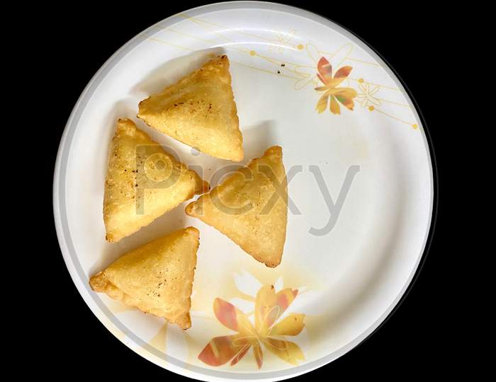 Hot Samosa Getting Ready To Be Served In A Plate For Evening Snacks