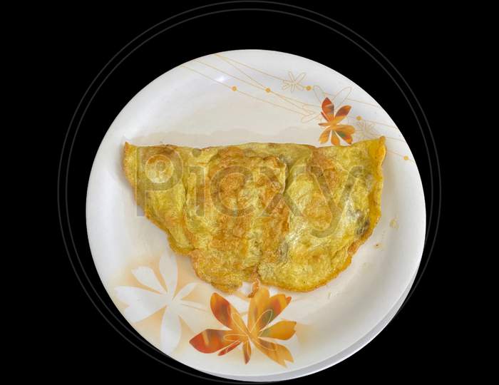 Egg Omelette Ready And Served In A Plate For Morning Breakfast