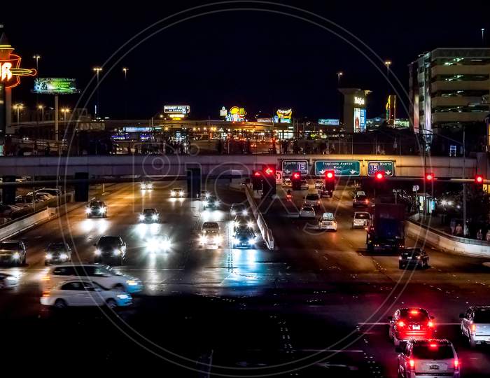 Traffic On The Strip Illuminated At Night In Las Vegas