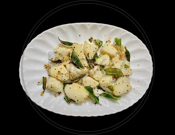 Delicious Seasoned Or Fry Idly Or Idli Served In A Plate