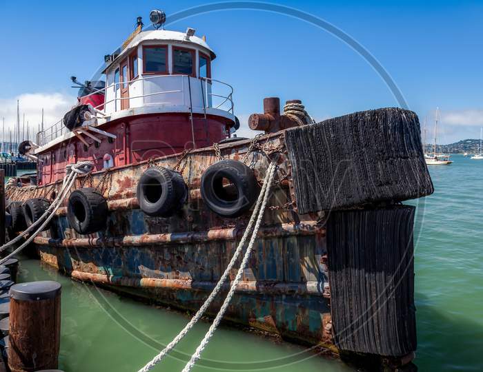 Old Tugboat Moored At The Jetty In Sausalito