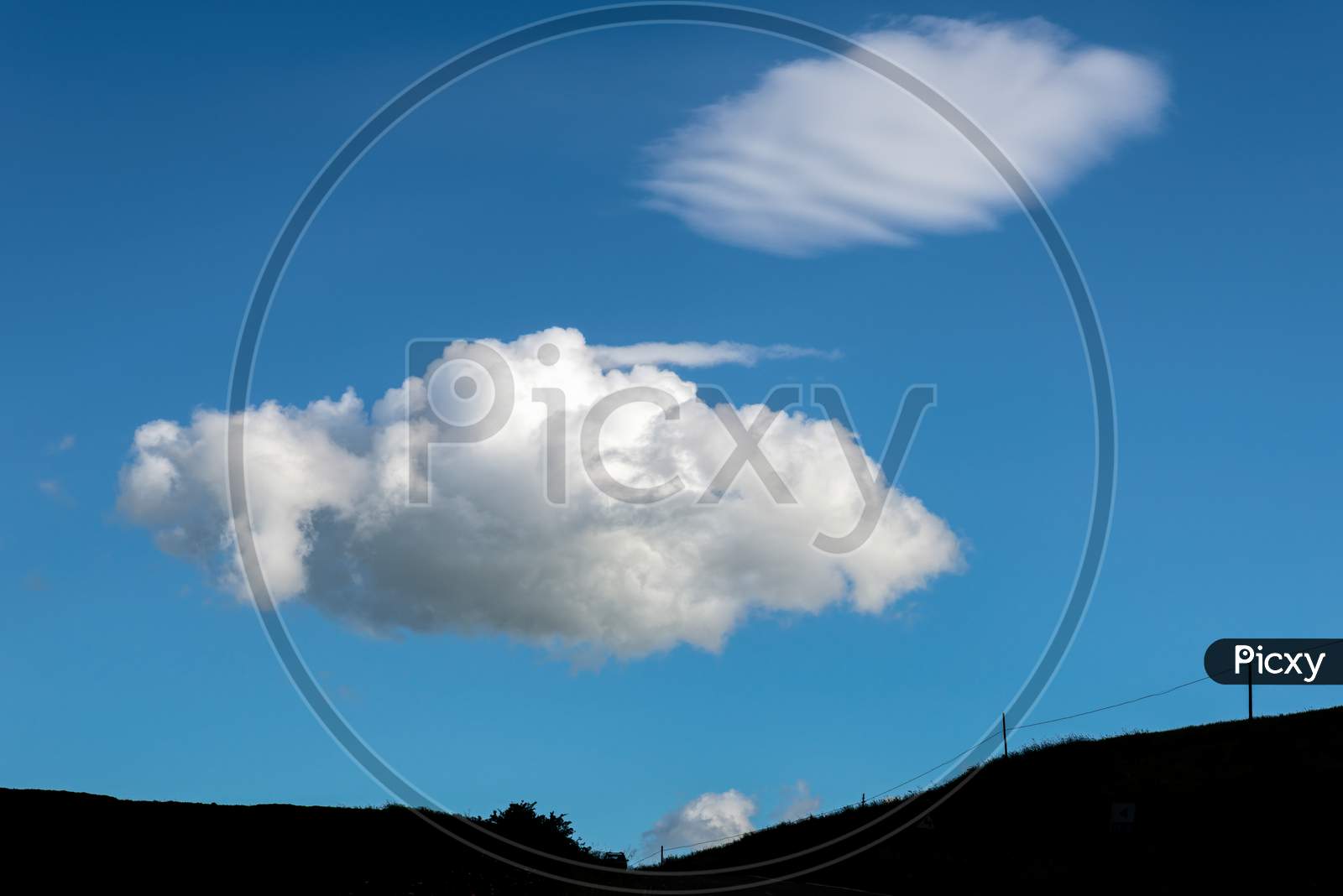 Fluffy Cloud Passing Over Val D"Orcia Tuscany