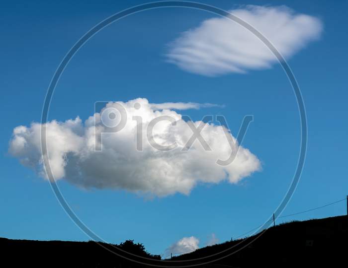 Fluffy Cloud Passing Over Val D"Orcia Tuscany