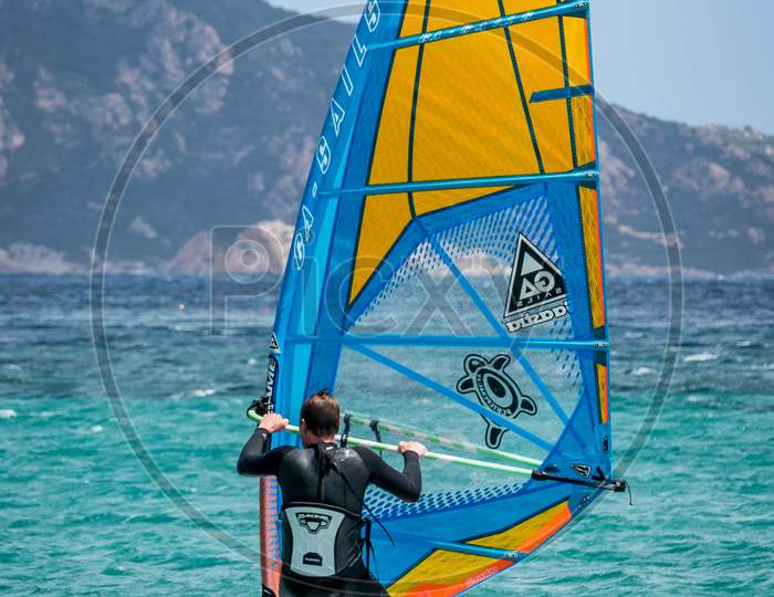 Porto Pollo, Sardinia/Italy - May 21 : Windsurfing At Porto Pollo In Sardinia On May 21, 2015. Unidentified Man