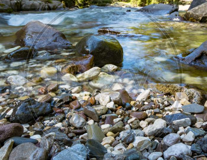 View Of The River Or Torrent In The Natural Park Of Paneveggio Pale Di San Martino In Tonadico, Trentino, Italy