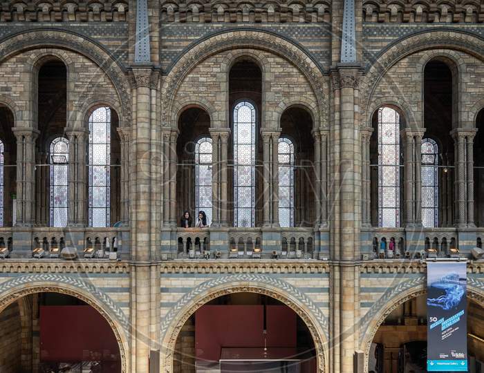 Interior View Of The Natural History Museum In London. Unidentified Women