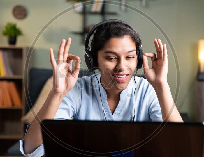 Pov Shot Of Young Business Woman Talking To Camera By Doing Namaste Gesture - Concept Of Video Chat, Conference Or Vlogging From Home By Looking At Camera.
