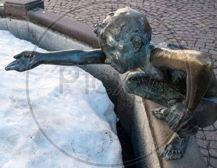 Statue Of A Child In Ortisei