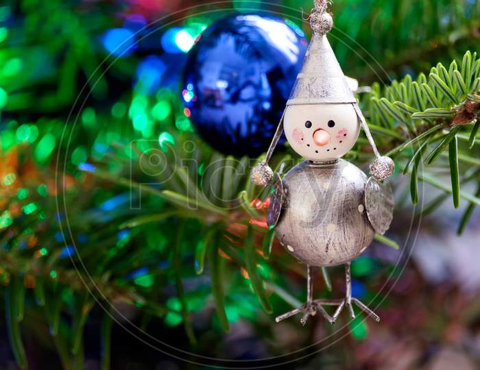 Toy Bird On A Christmas Tree