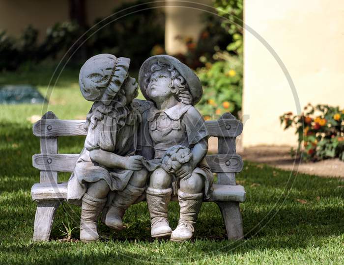 Statue Of A Boy And Girl In Calahonda