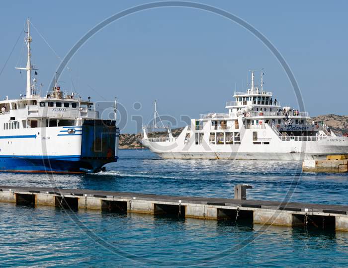 Car Ferries Leaving And Entering  Palau Port Sardinia