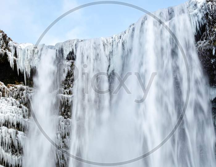 View Of Skogafoss Waterfall In Winter
