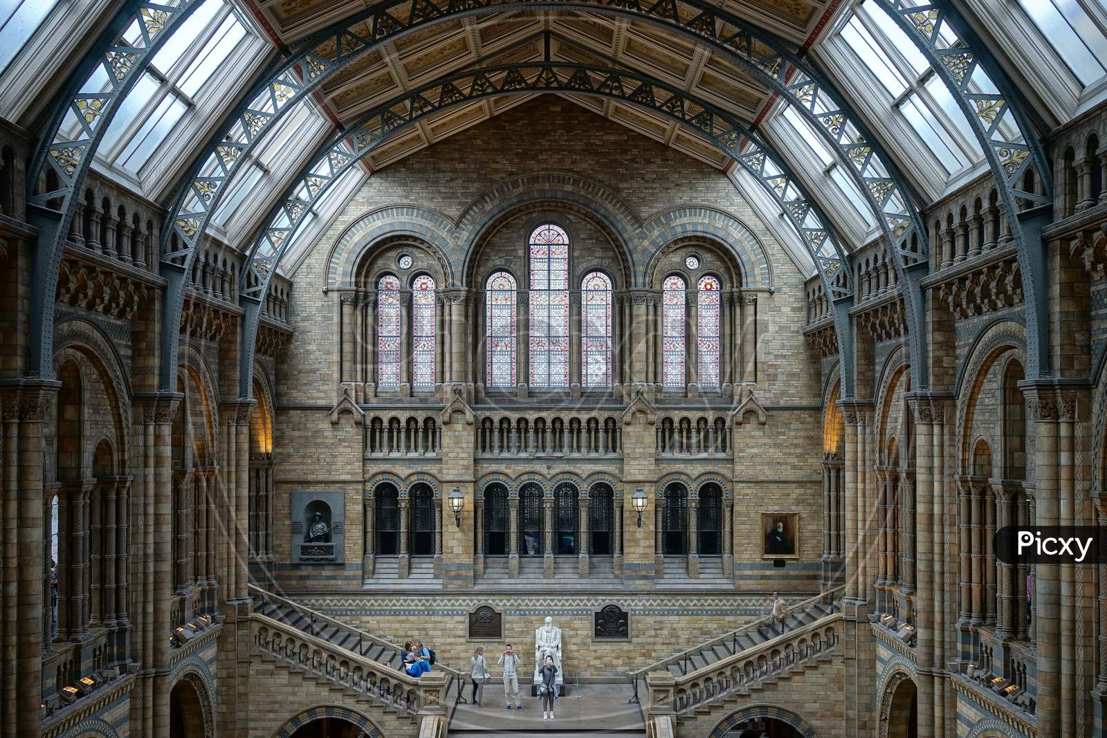 People On A Staircase In The National History Museum In London