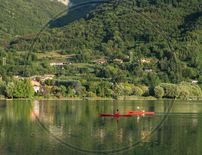 People Kayakings At Lake Endine Near Bergamo