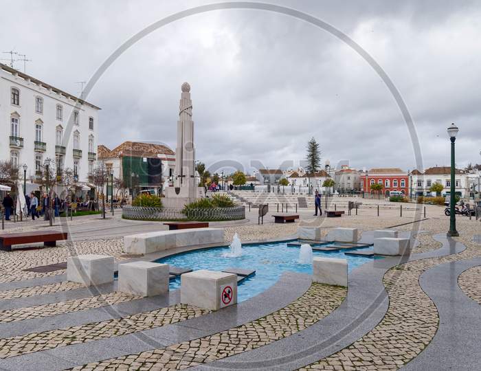 Tavira, Southern Algarve/Portugal - March 8 : Water Feature In The Square At Tavira Portugal On March 8, 2018. Unidentified People