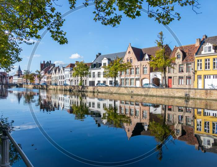 View Along A Canal In Bruges West Flanders In Belgium