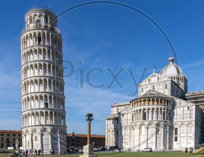 Pisa, Tuscany/Italy  - April 18 : Exterior View Of The Leaning Tower And Cathedral In Pisa Tuscany Italy On April 18, 2019. Unidentified People