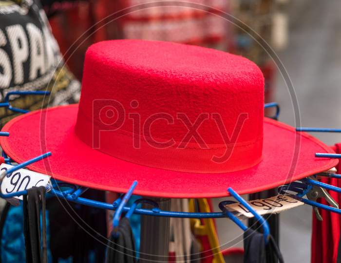 Granada, Andalucia/Spain - May 7 : Red Hat For Sale In Granada Spain On May 7, 2014