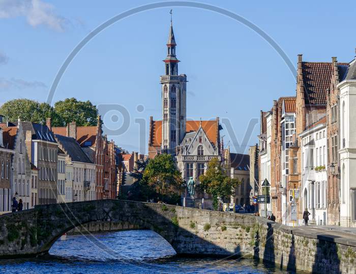 View Down A Canal In Bruges West Flanders In Belgium