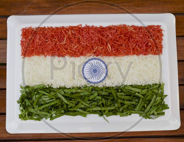 Indian Republic Day Theme Indian Flag Depicted By Food. Salad Of Fresh Raw Grated Carrot, Radish And Spinach