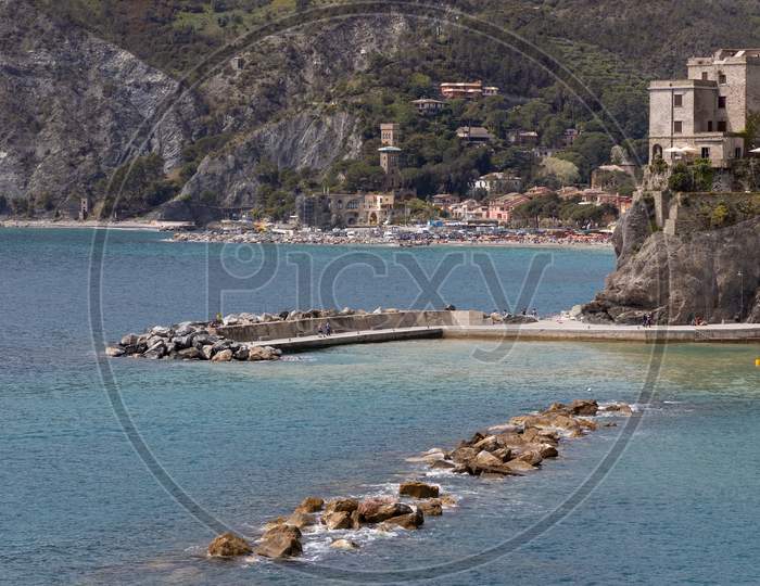 Monterosso, Liguria/Italy  - April 22 : View Of The Coastline At Monterosso Liguria Italy On April 22, 2019. Unidentified People