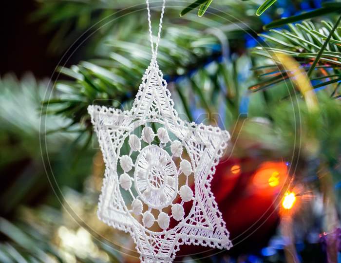 Crocheted Star On A Christmas Tree
