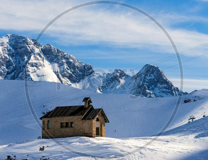 View Of A Chapel In The Dolomites At The Pordoi Pass