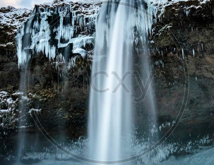 View Of Seljalandfoss Waterfall In Winter