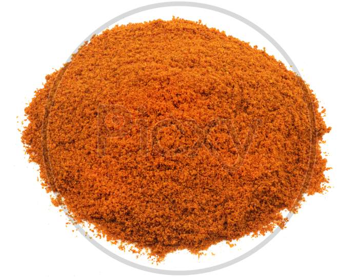 Heap Of Red Chilli Powder On White Background